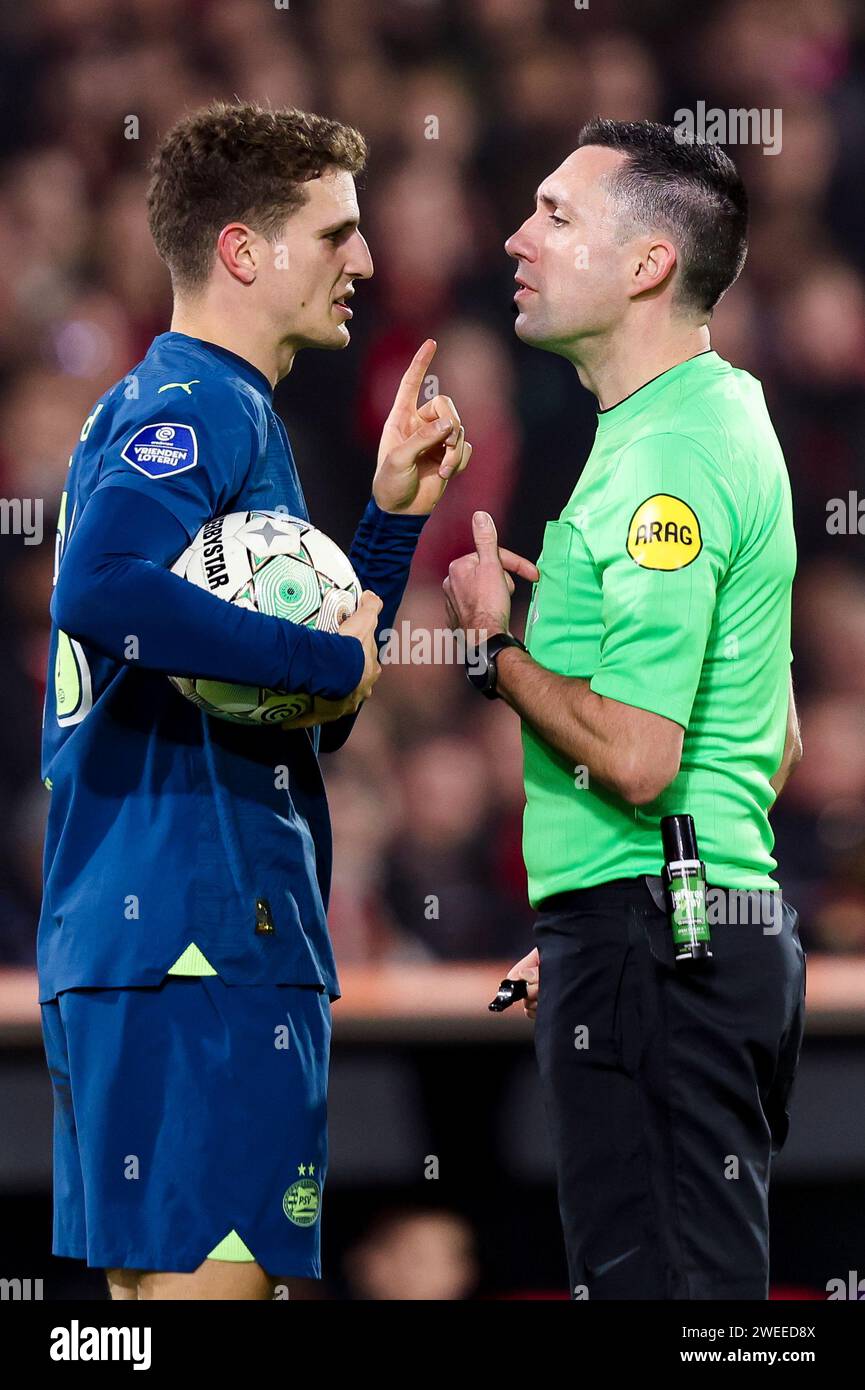 ROTTERDAM, NETHERLANDS - JANUARY 24: Guus Til (PSV) and referee Dennis Higler during the Eredivisie match of SC Feyenoord and PSV Eindhoven at de Kuip Stock Photo
