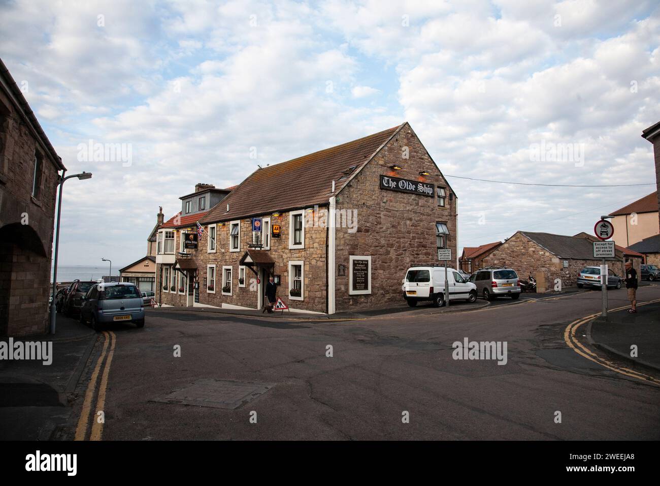 The Olde Ship Inn above the harbour at Seahouses, Northumberland, England dating from 1745 and originally serving the fisherman in the locality Stock Photo