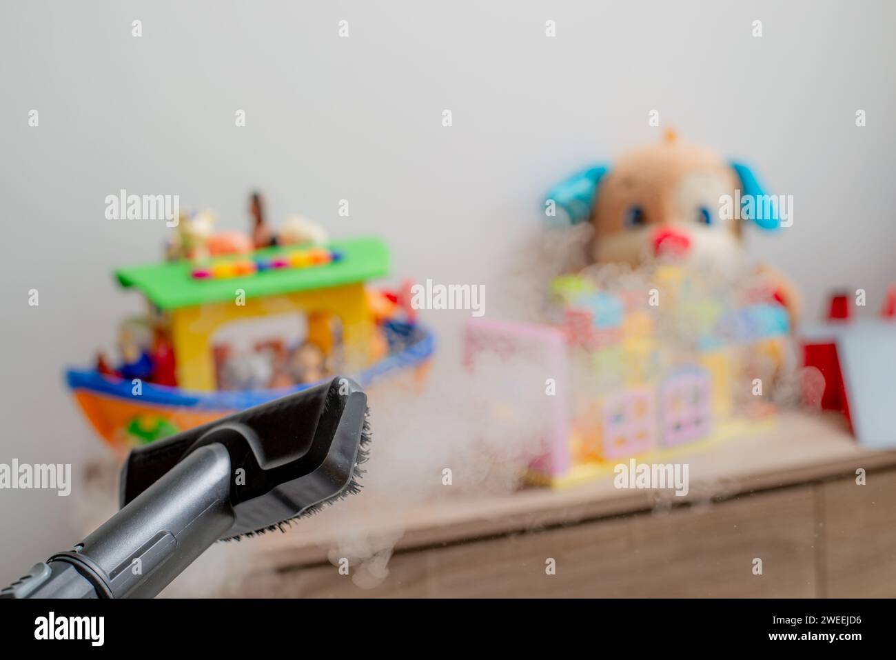 Steam cleaning toys. cleaning toys Stock Photo Alamy