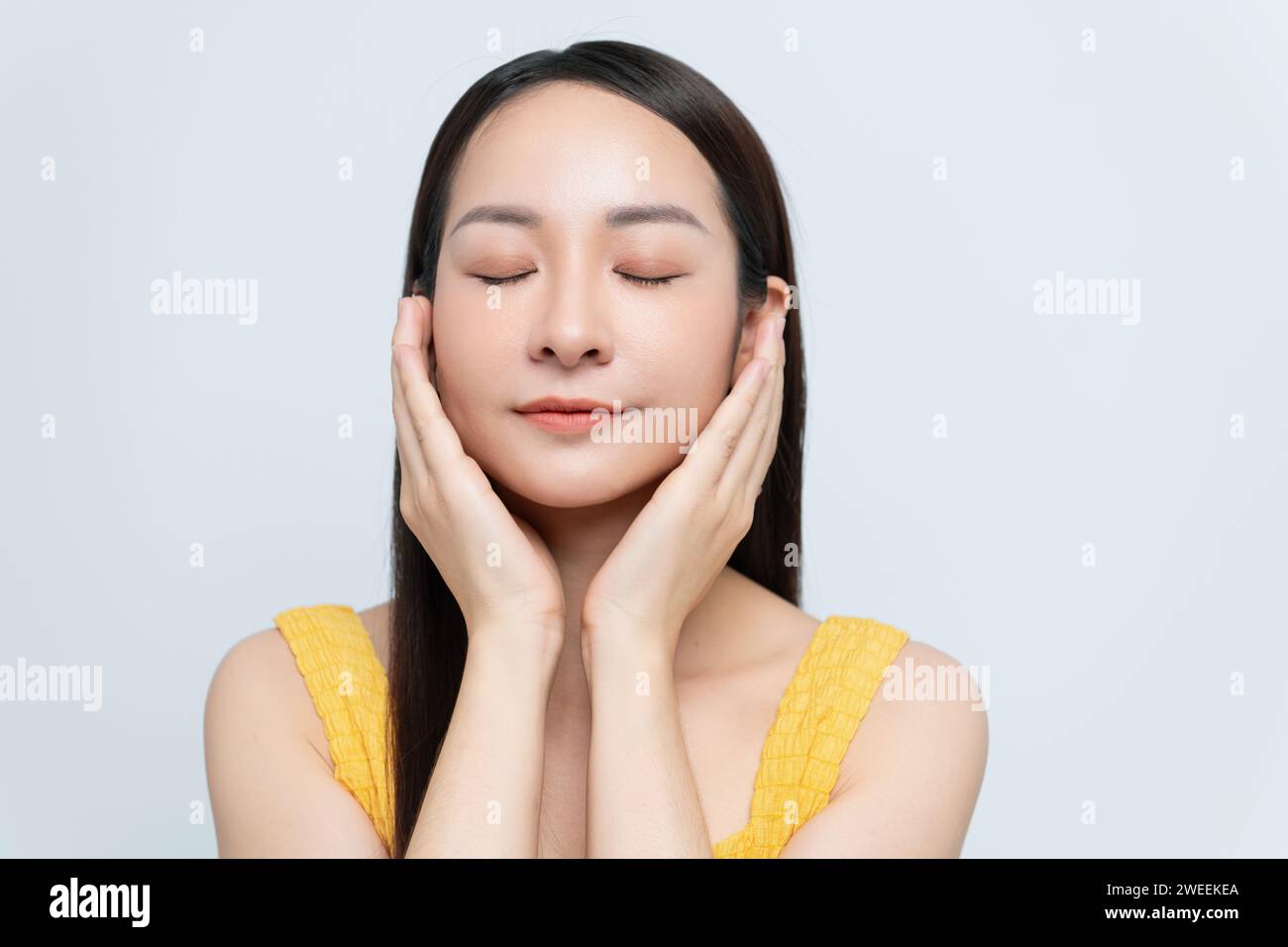 young attractive asian woman relaxing Stock Photo - Alamy