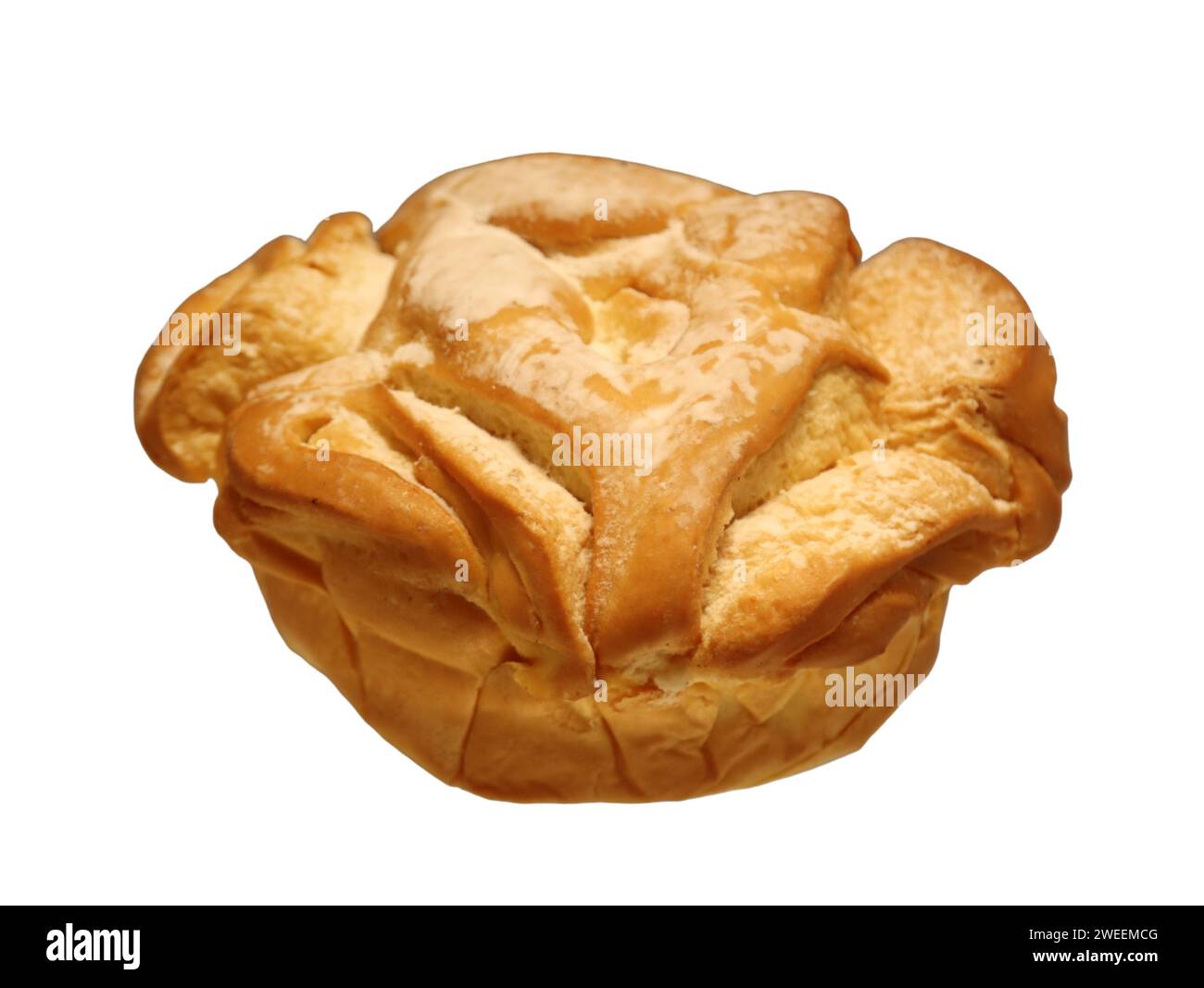 An arrangement of bakery goods, with several loaves of bread placed in