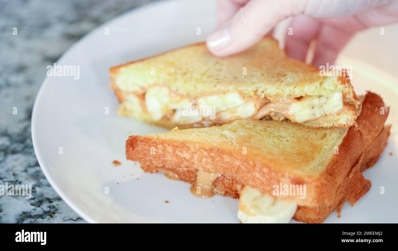 Grilled peanut butter banana sandwich Stock Photo Alamy