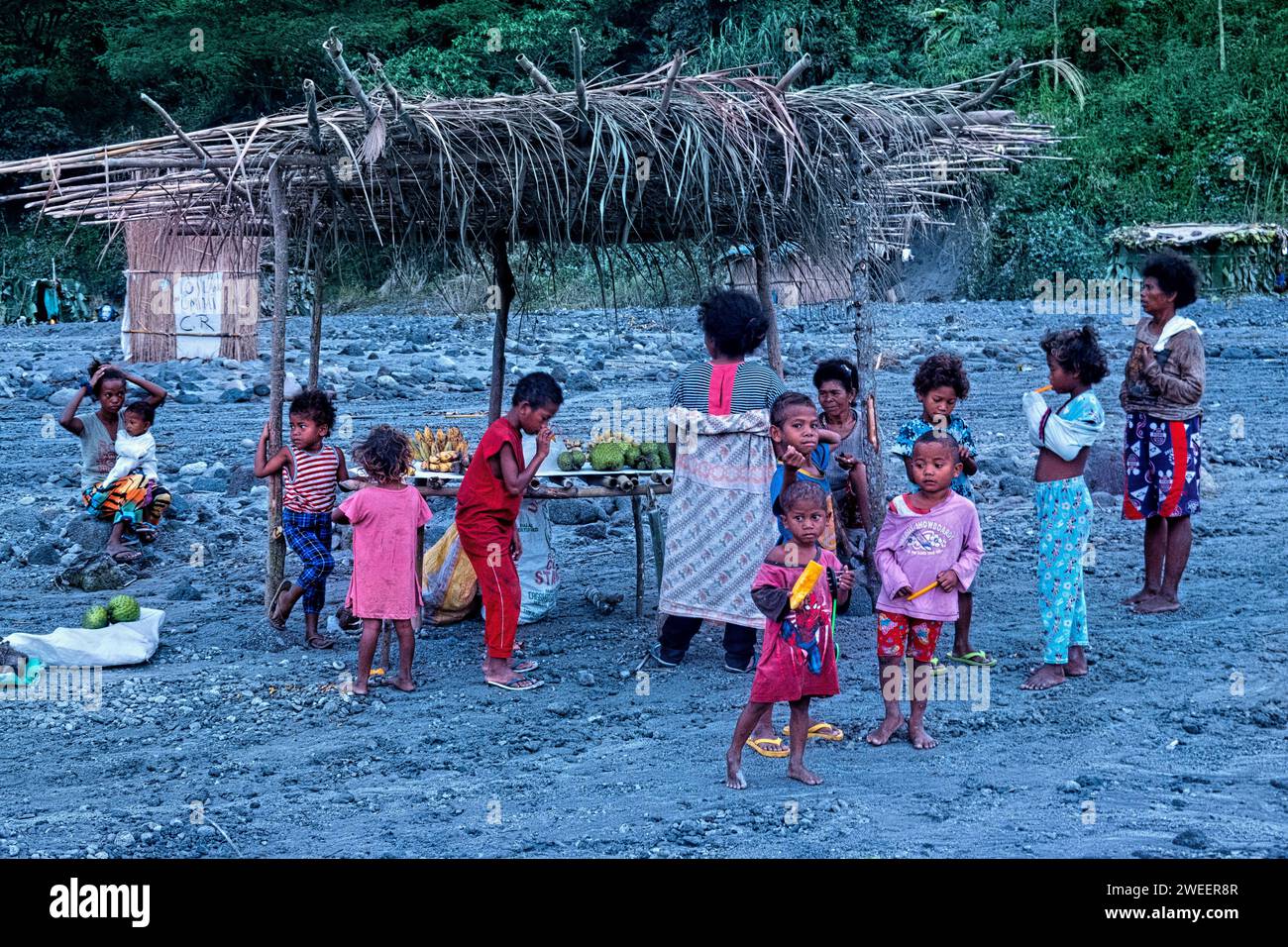 Indigenous Aeta people selling soursop at Mount Pinatubo, Zambales, Luzon, Philippines Stock Photo