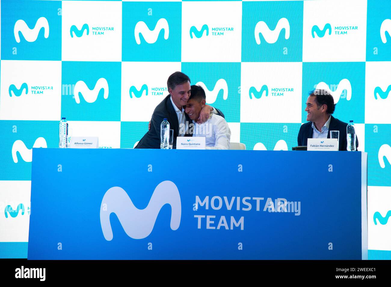Alfonso Gomez the CEO of Telefonica Hispam (L), cyclist Nairo Quintana (C) and Fabian Hernandez CEO of Movistar Colombia (R), speak during a press con Stock Photo