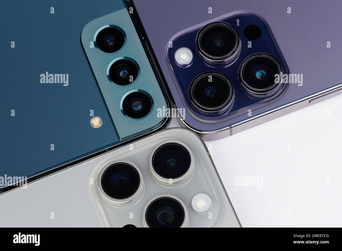 New York, USA - January 20, 2024: Camera war of flagship smartphones android and IOS based Stock Photo