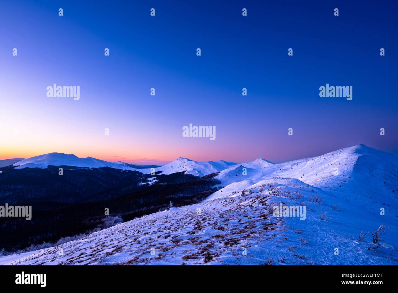 Winter sunset in the mountains. Bieszczady National Park, Poland. Stock Photo