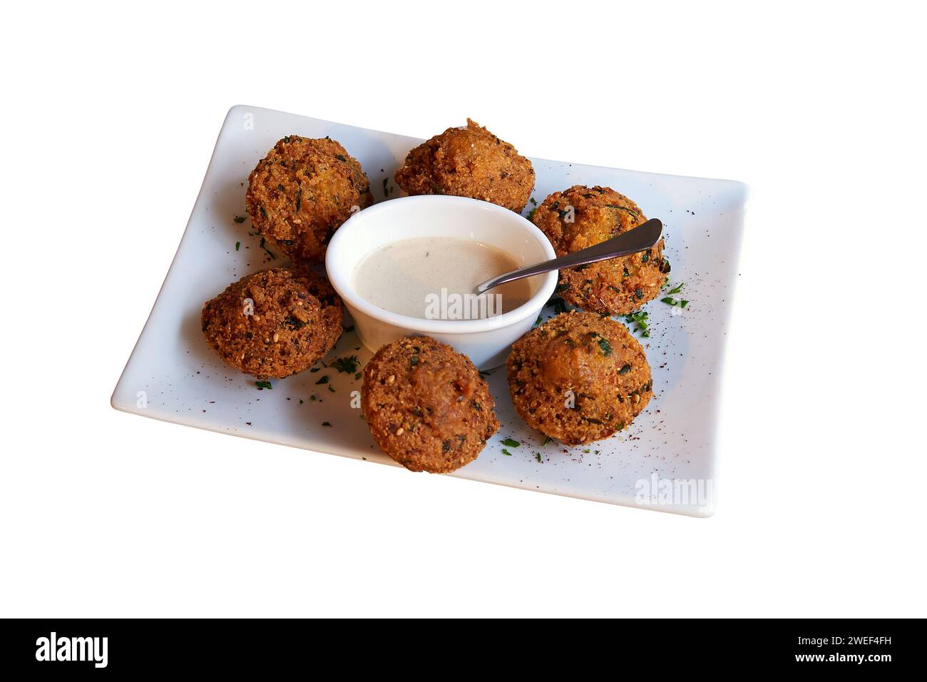 Plate of traditional falafel and sesame seeds view from above and isolated with clipping path Stock Photo