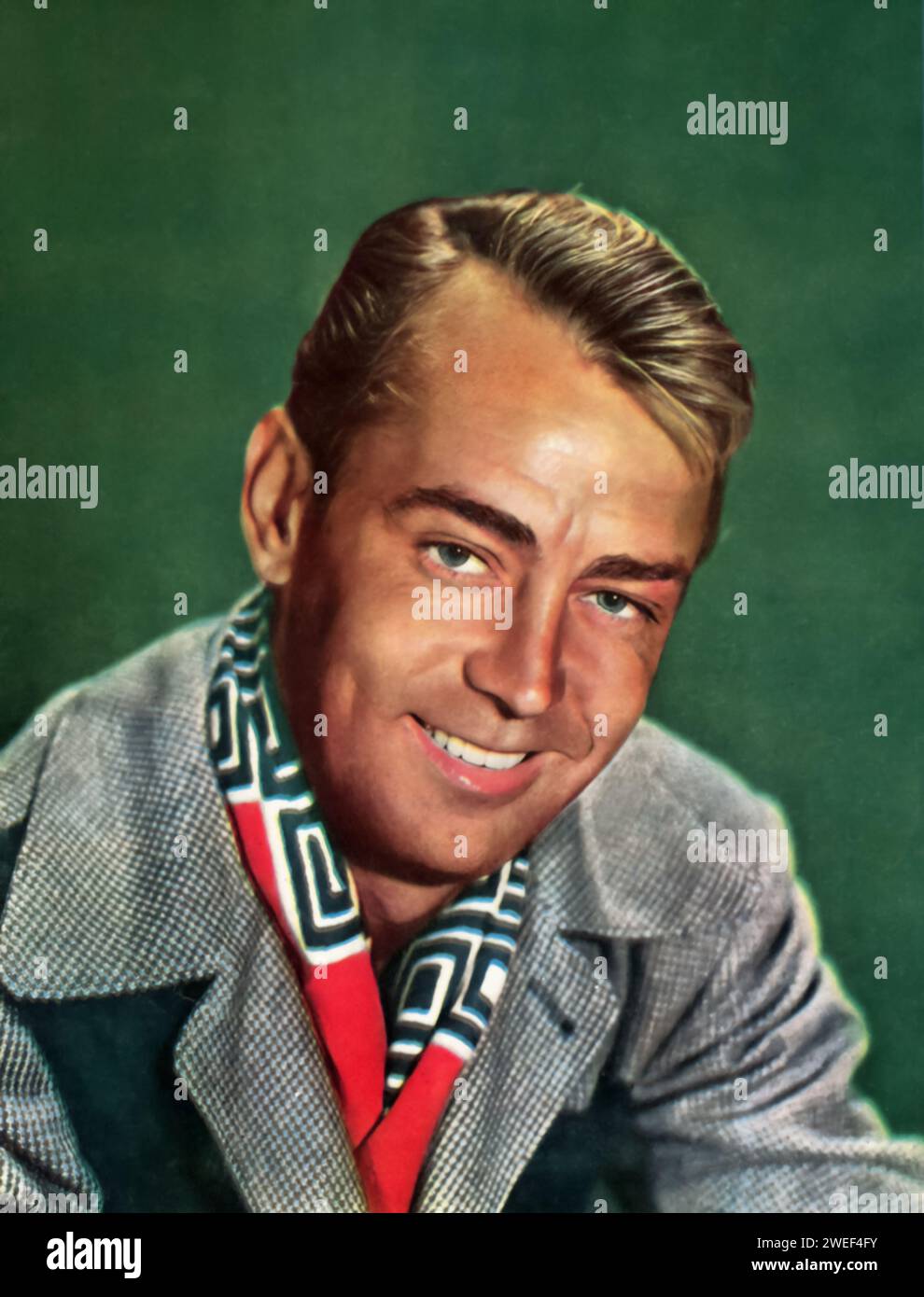 Alan Ladd stars in 'The Great Gatsby' (1949), a film adaptation of F. Scott Fitzgerald's classic novel. In this version, Ladd portrays the enigmatic and wealthy Jay Gatsby, a man obsessed with the past and his lost love, Daisy Buchanan. Stock Photo