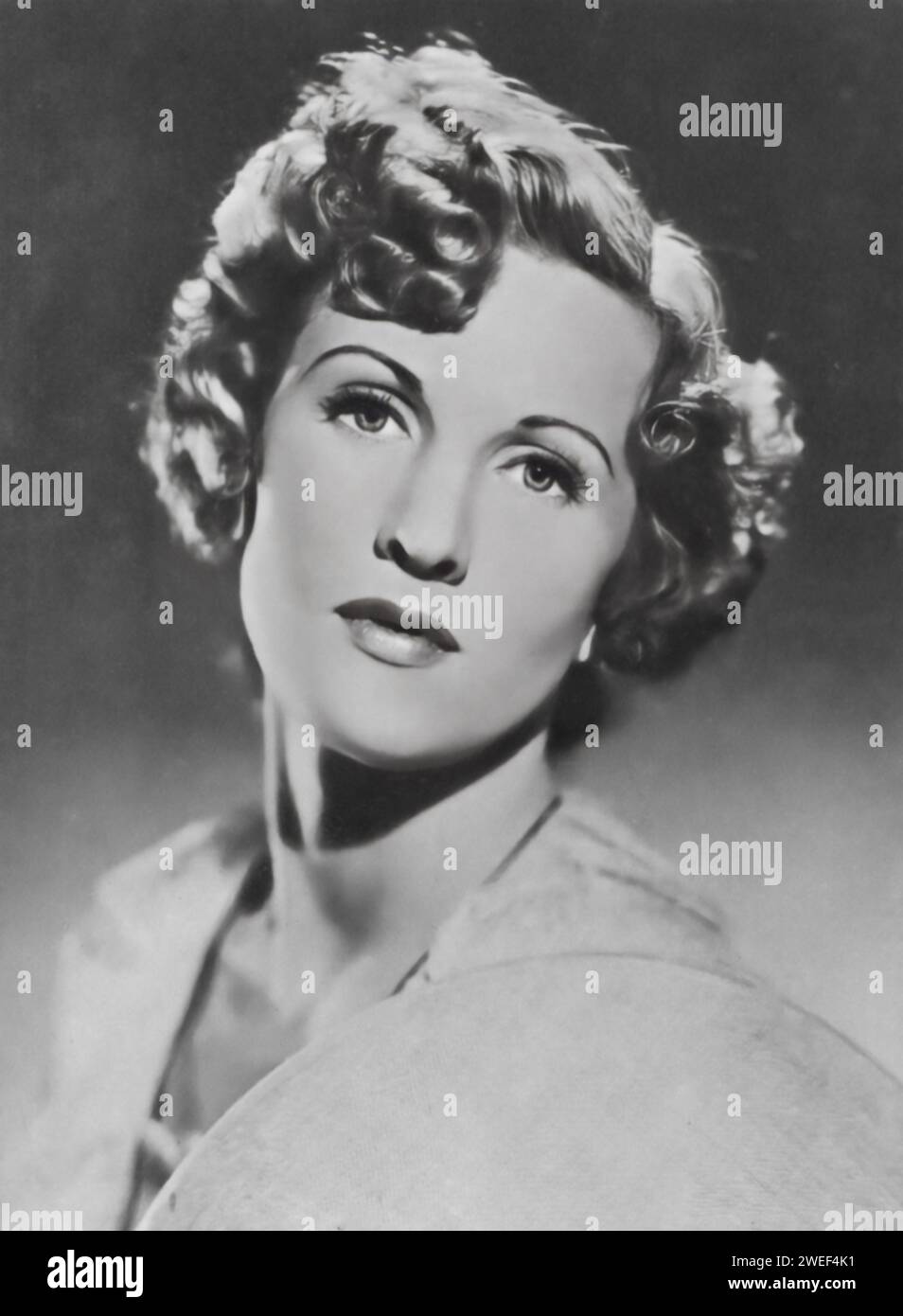 A portrait of Anne Crawford, an actress celebrated for her role in the film 'They Were Sisters' (1945). In this British drama, Crawford portrays Vera, one of three sisters, each facing their own struggles and challenges in life. Her character deals with the complexities of a troubled marriage, showcasing Crawford's skill in portraying nuanced and emotionally charged roles. Stock Photo