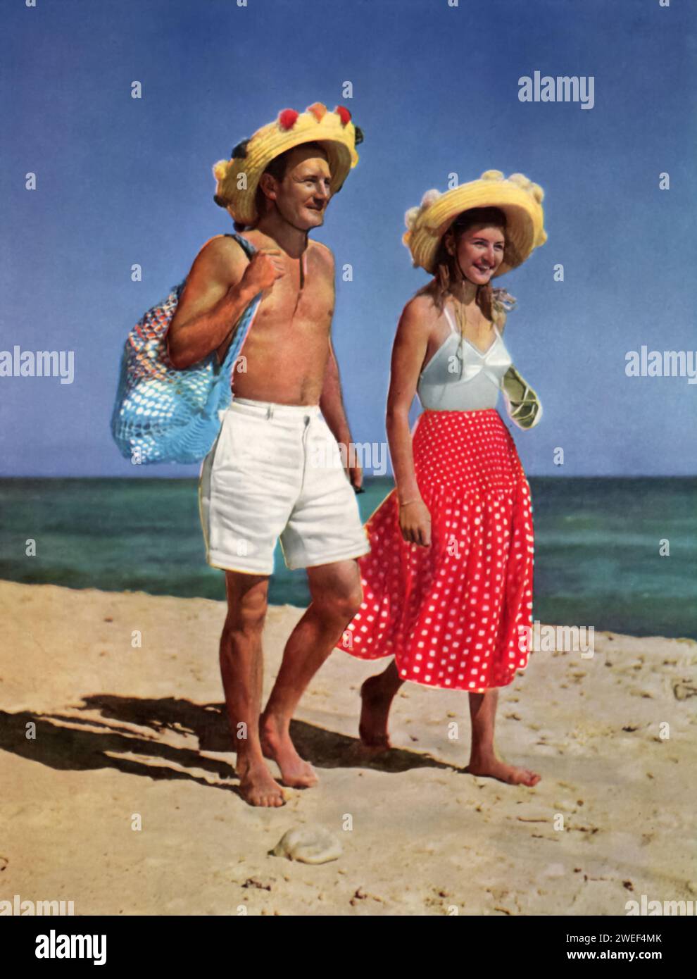 Trevor Howard and Anouk Aimée are featured walking along a Tunisian beach in the film 'The Golden Salamander' (1950). This adventure film has Howard playing David Redfern, an archaeologist who uncovers a smuggling ring in a small Tunisian town, with Anouk portraying the beautiful and mysterious Anna. Stock Photo