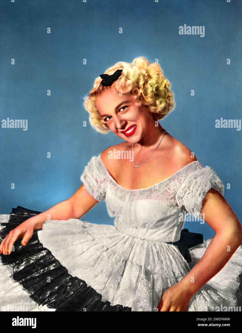 A portrait of Betty Hutton, an actress and star celebrated for her dynamic role in 'Annie Get Your Gun' (1950). Known for her energetic screen presence and powerful singing voice, Hutton brought to life the character of sharpshooter Annie Oakley in this popular musical. Stock Photo