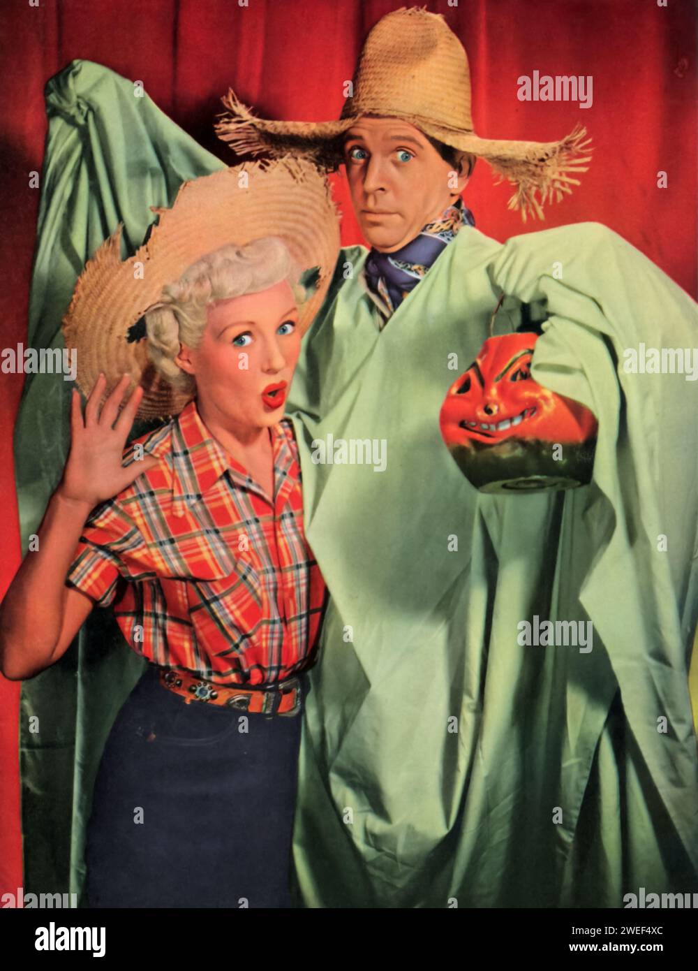 Dan Dailey and Betty Grable star in 'My Blue Heaven' (1950), a vibrant musical film. In this movie, Dailey and Grable play Jack and Kitty Moran, a married couple who are also successful song-and-dance performers. The plot revolves around their journey to adopt a child while balancing their careers in show business. Stock Photo