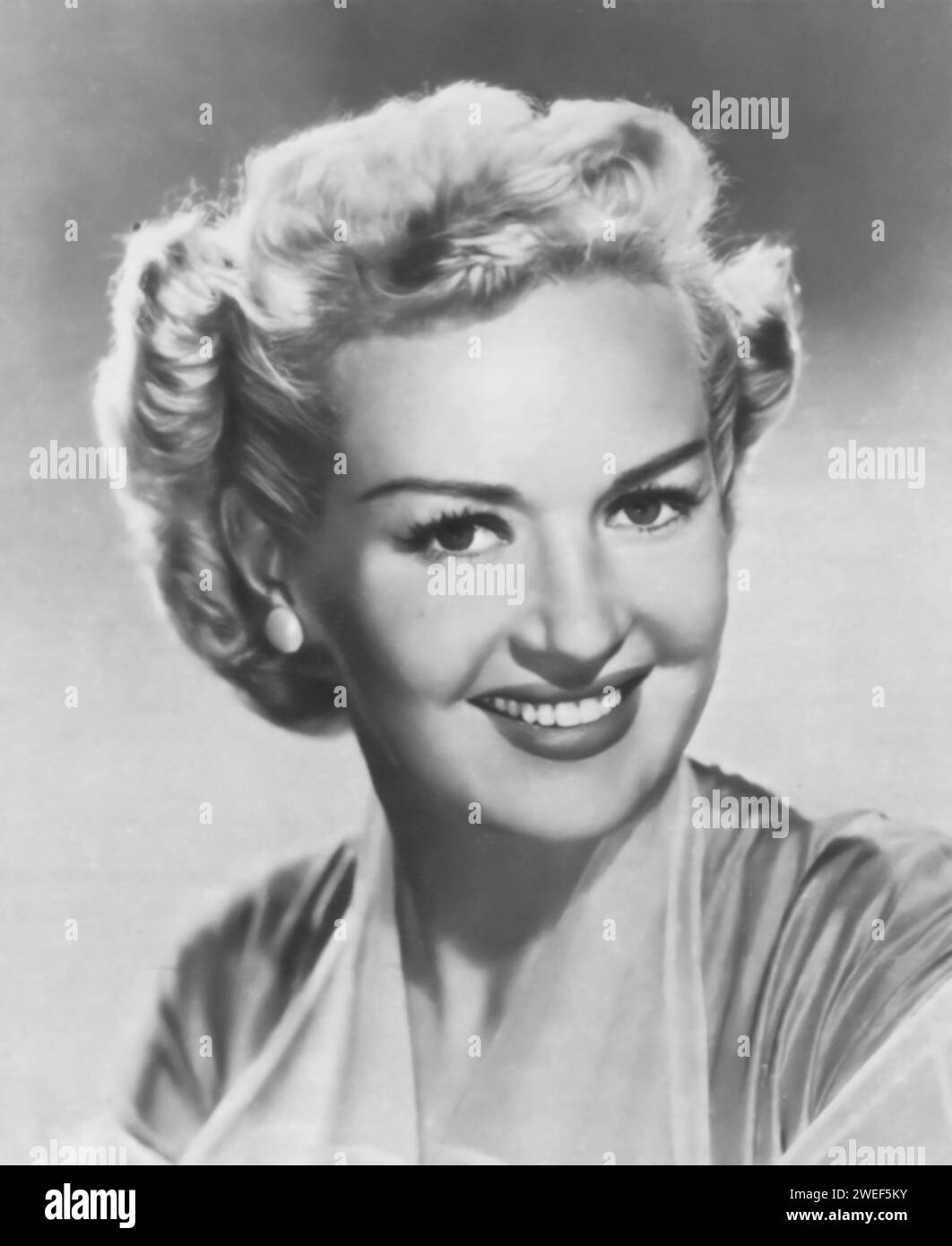 A portrait of actress Betty Grable, celebrated for her roles in films like 'Call Me Mister' (1951). In this musical comedy, Grable plays Kay Hudson, a USO performer and the former wife of a soldier, portrayed by Dan Dailey. The film is set in post-World War II Japan and features a mix of song, dance, and lighthearted romance. Stock Photo