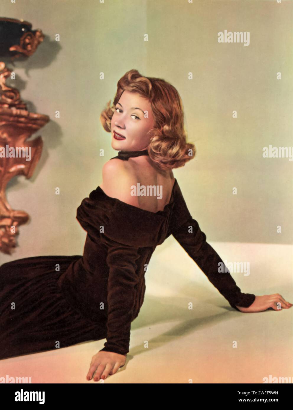 A portrait of actress and star Gloria Grahame, known for her role in 'Roughshod' (1949). In this Western film, Grahame plays Mary Wells, a dance hall girl with a tough exterior. The story follows a small group of women, including Mary, being escorted through dangerous territory by a pair of brothers, played by Robert Sterling and John Ireland. Grahame's character is central to the film's narrative, which combines elements of drama, romance, and the classic Western genre. Stock Photo