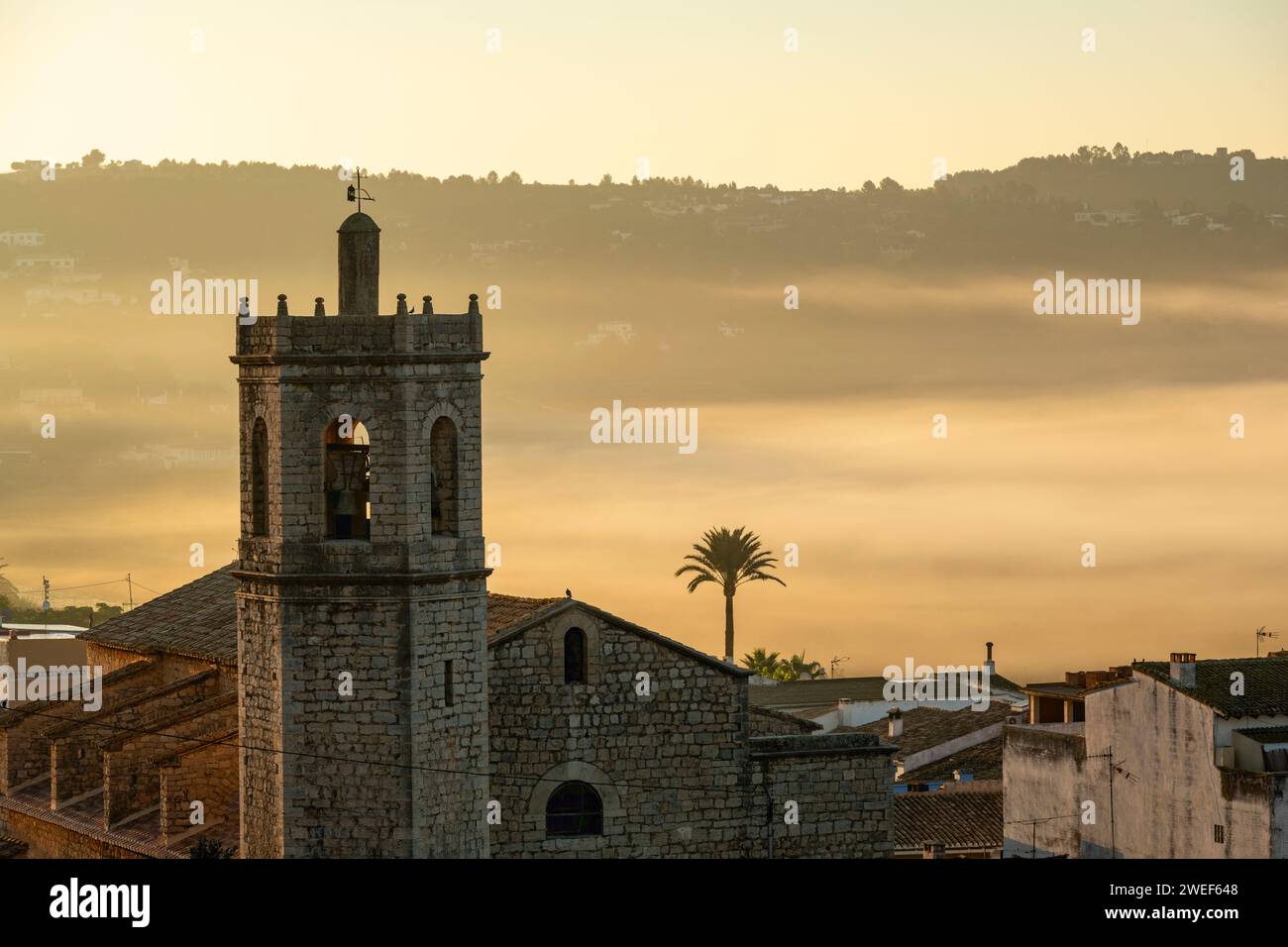 Church tower and village building at Lliber, Costa Blanca, Marina Alta, Alicante province, Spain - stock photo Stock Photo