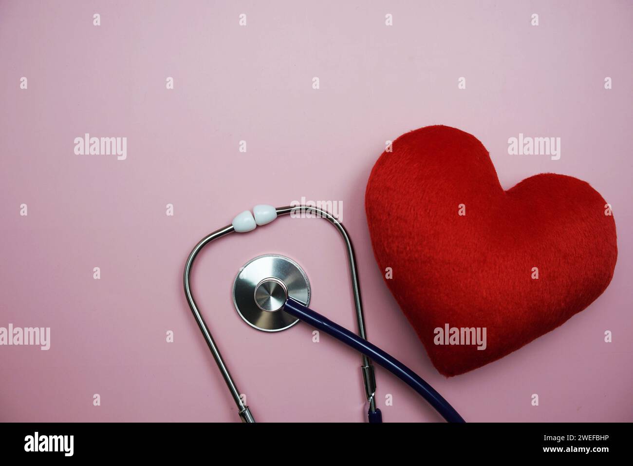 Heart and Stethoscope with space copy on pink background Stock Photo ...