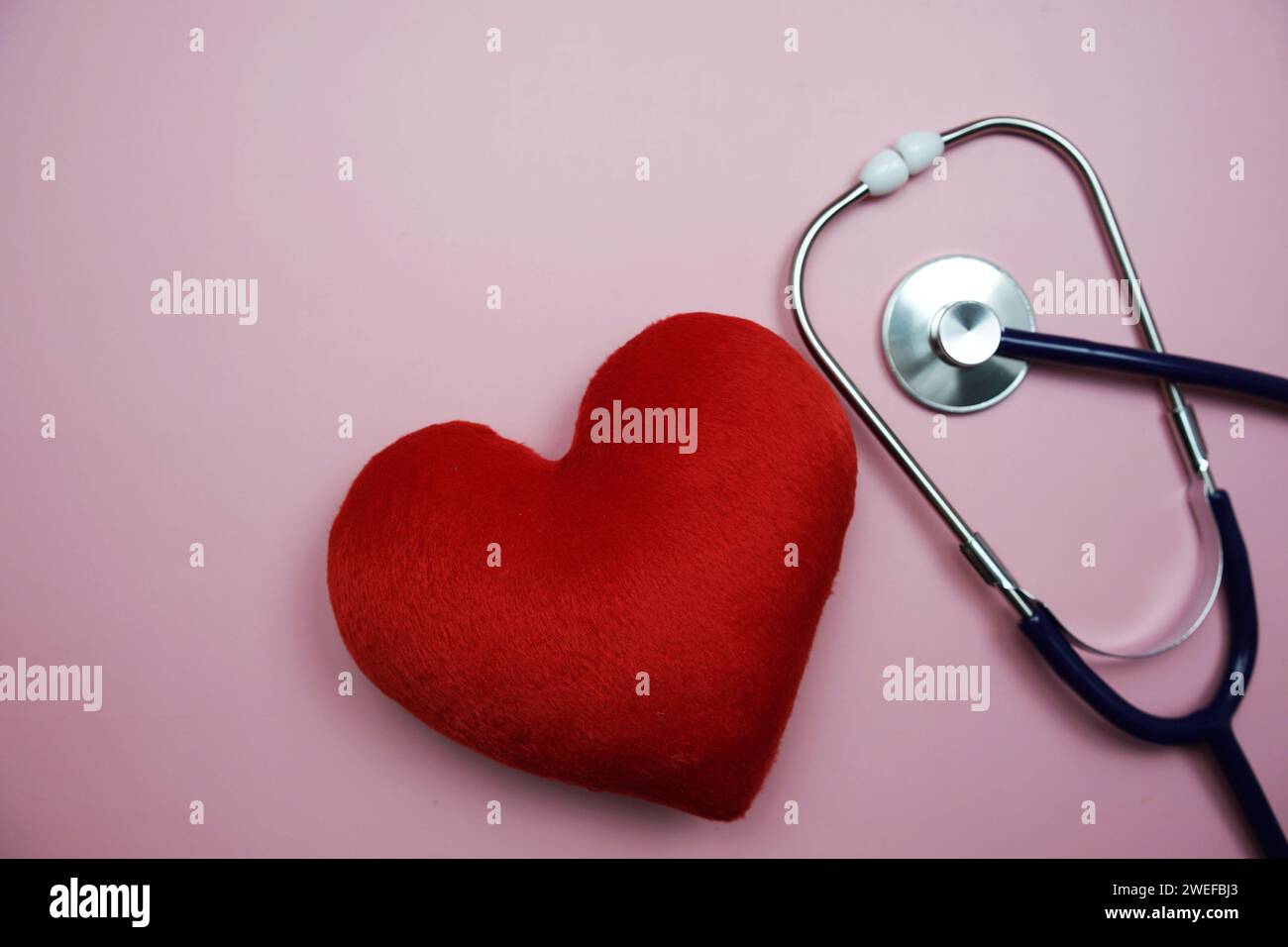 Heart and Stethoscope with space copy on pink background Stock Photo ...
