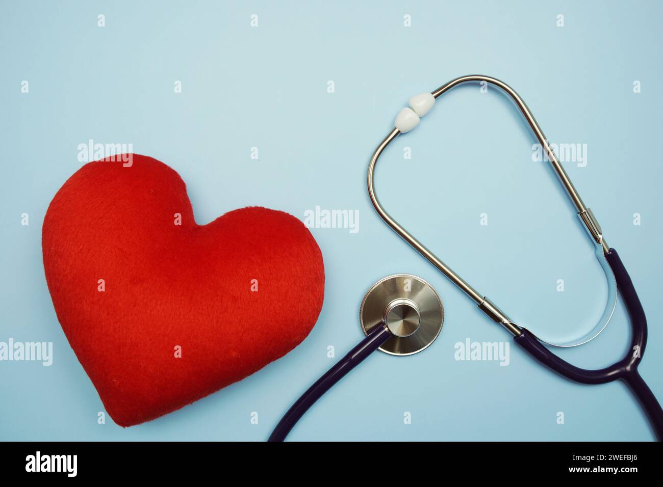 Heart and Stethoscope with space copy on blue background Stock Photo ...
