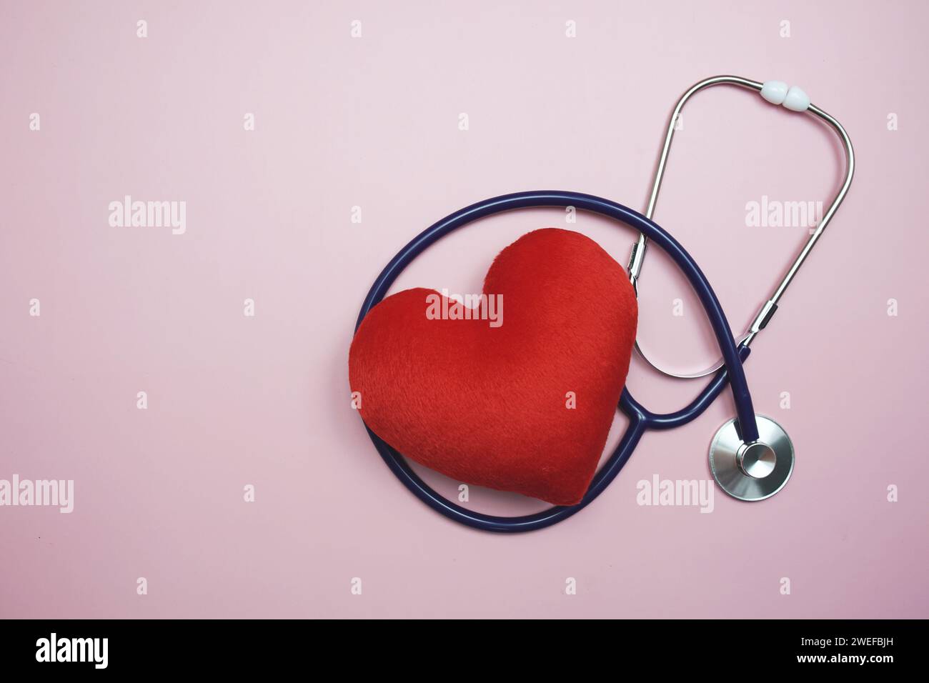 Heart and Stethoscope with space copy on pink background Stock Photo ...