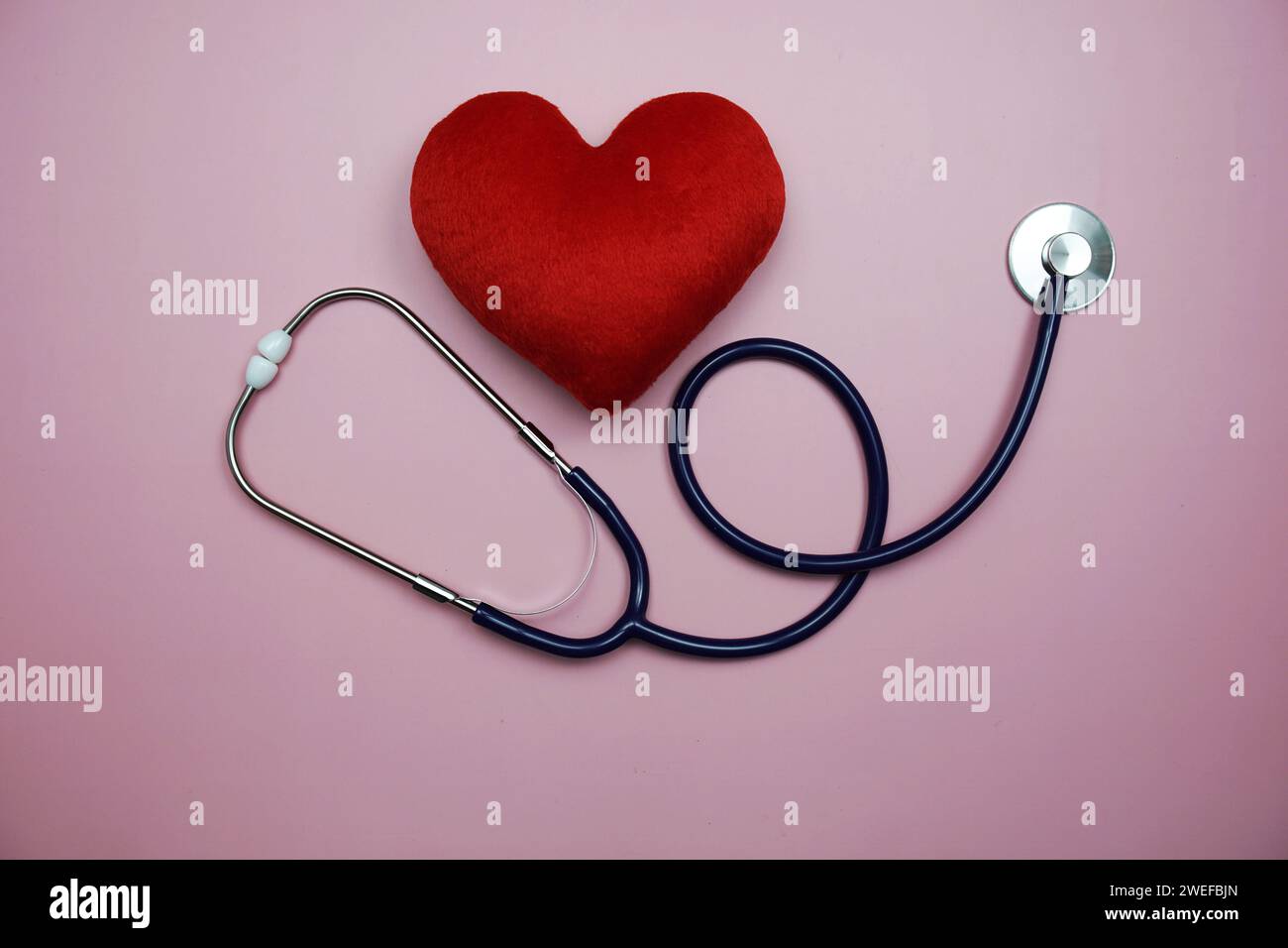 Heart and Stethoscope with space copy on pink background Stock Photo ...