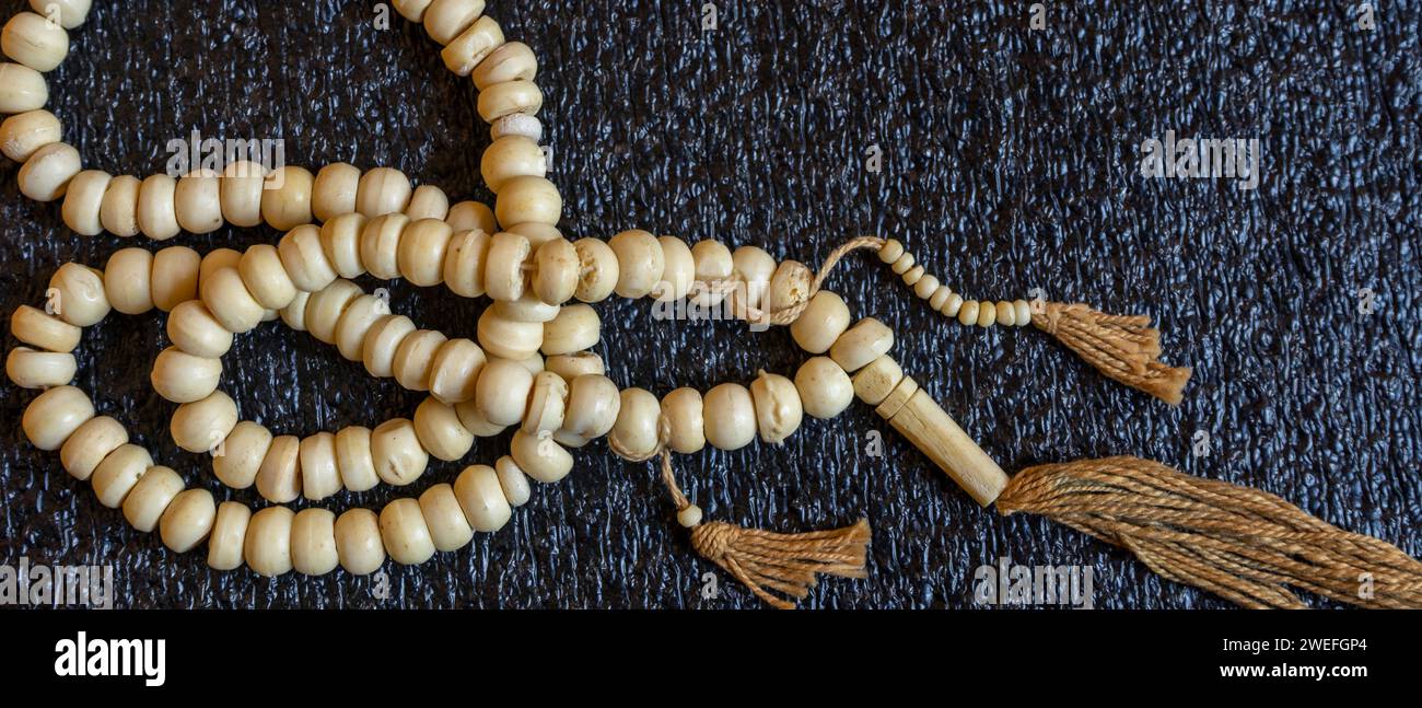 Wooden prayer beads for religion concept Stock Photo