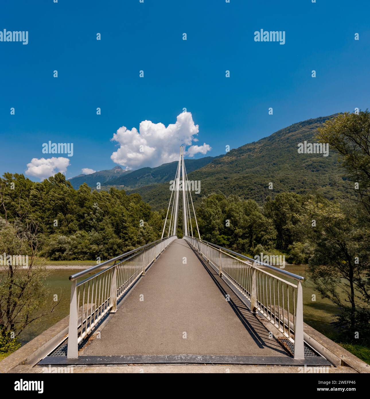 Footbridge in the middle of the forest, beautiful architecture with a large engineering firm. The object is located in Switzerland, it is a sunny day Stock Photo