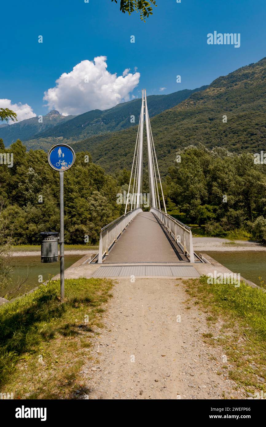 Pedestrian footbridge in the middle of the forest, beautiful architecture comn a great engineering study. The object is located in Switzerland, it is Stock Photo