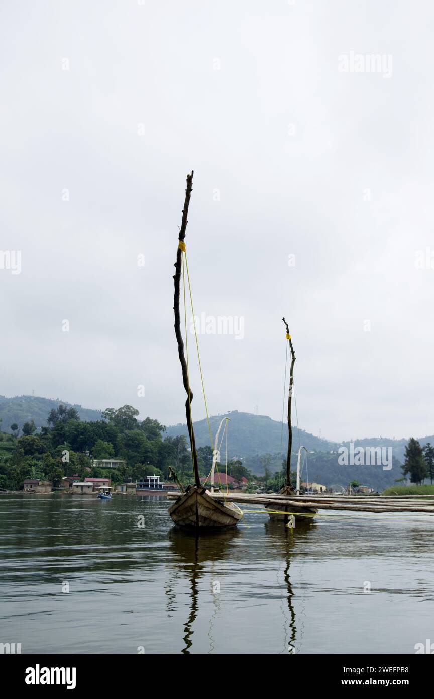 Traditional fishing vessels boats still used to fish on Lake Kivu often for sambaza (Limnothrissa miodon) a small fish resembling sardines Stock Photo