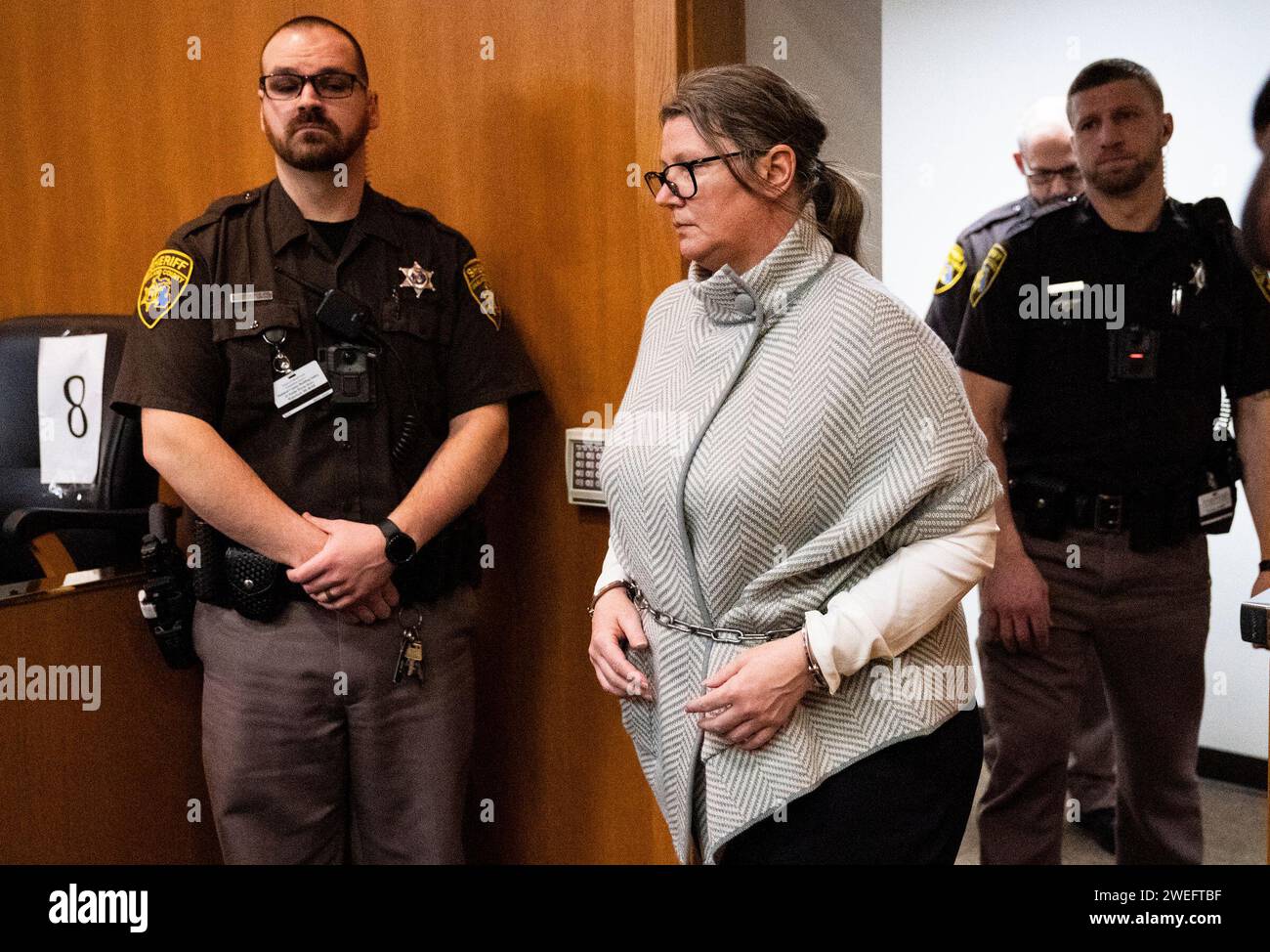 Jennifer Crumbley enters the courtroom of Oakland County Judge Cheryl