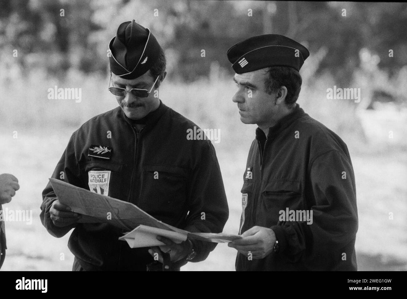 Police officers (CRS) take part in a beat in Vaulx-en-Velin area