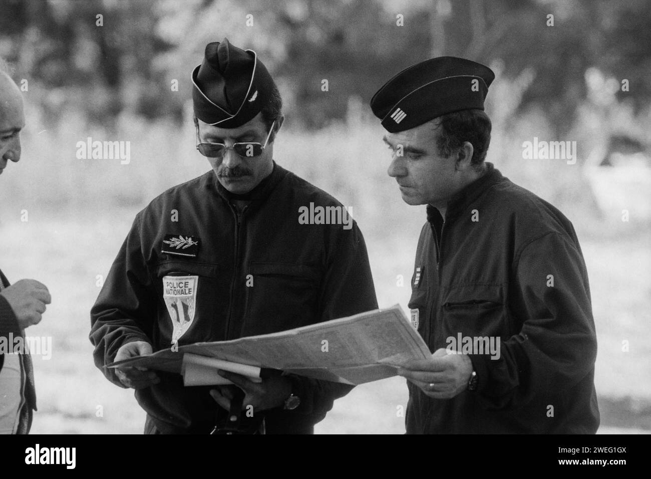 Police officers (CRS) take part in a beat in Vaulx-en-Velin area
