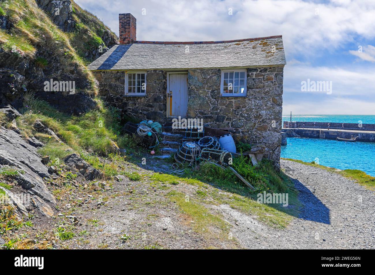 The Net Loft, a Fisherman's cottage, Mullion Cove Harbour, Lizard Peninsula, Cornwall, England, UK Stock Photo