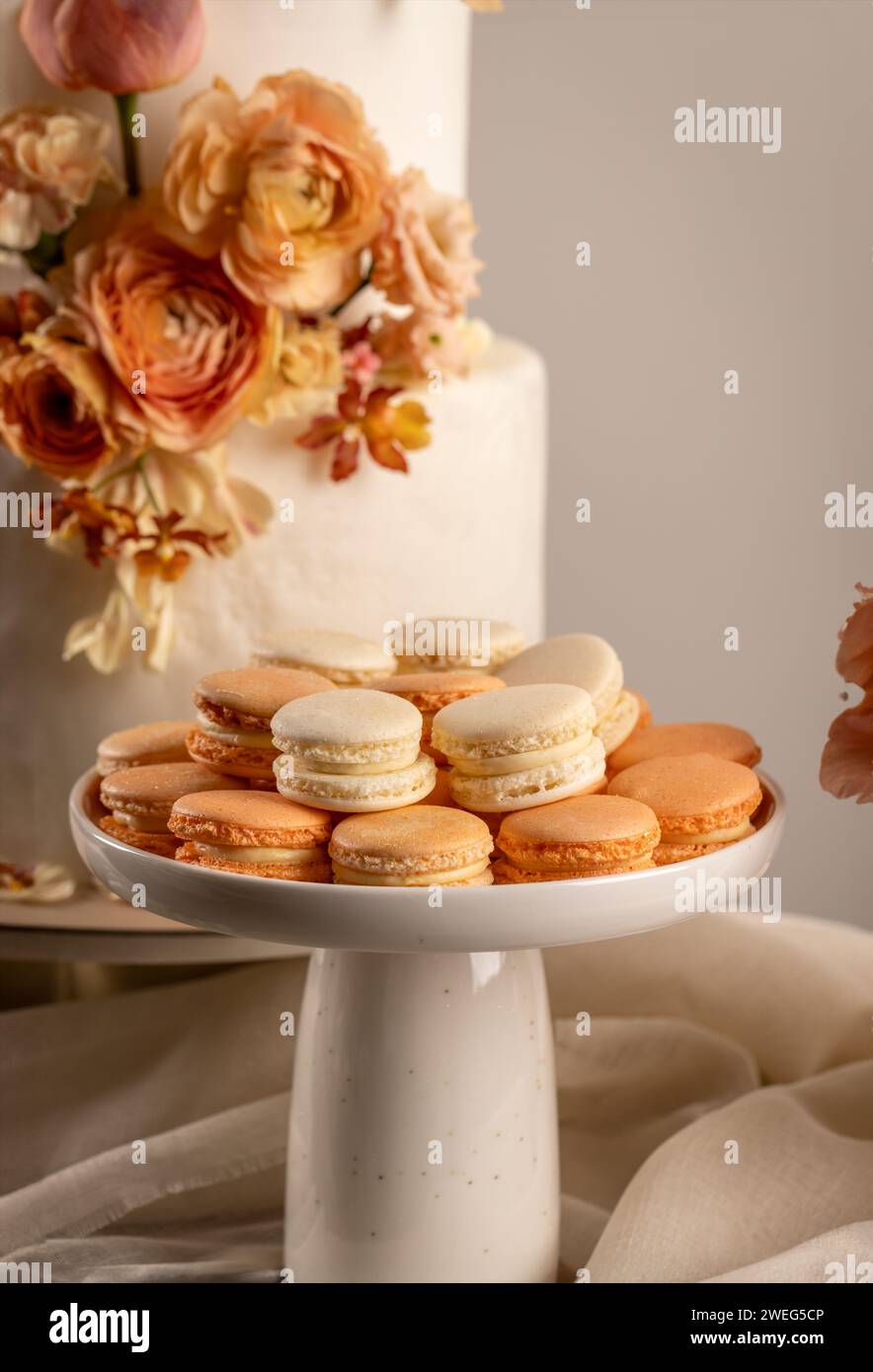 Pastel wedding sweet table setting. Macaron and wedding cake Stock Photo