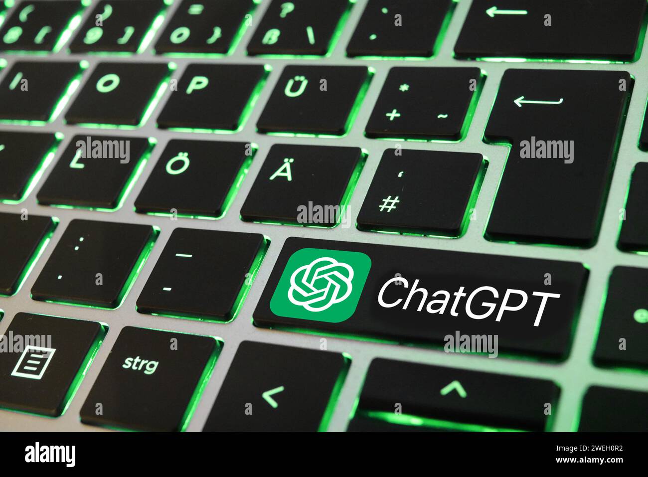 PHOTO MONTAGE! - Artificial Intelligence. Close-up of a laptop keyboard with ChatGPT key Stock Photo