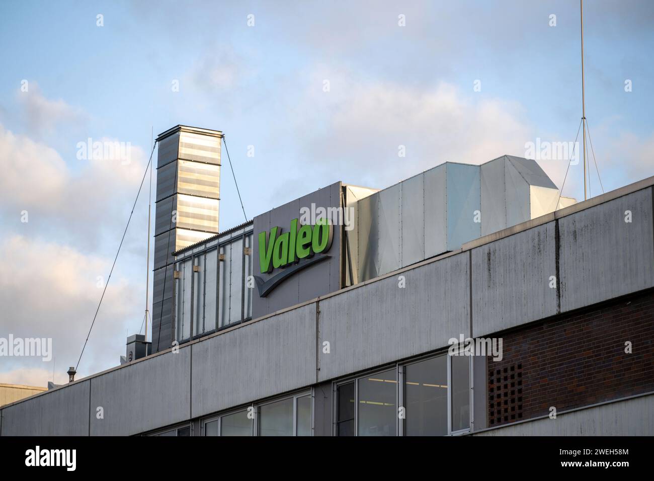 Ebern, Germany. 25th Jan, 2024. The Valeo logo is emblazoned on one of the automotive supplier's plants in Ebern. Credit: Pia Bayer/dpa/Alamy Live News Stock Photo