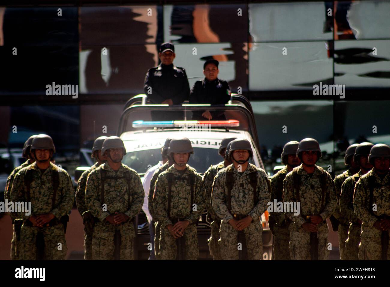 Chilpancingo, Guerrero, Mexico. 25th Jan, 2024. Rolando Solano Rivera  protests the position of Secretary of Public Security of Guerrero in the  executive branch, surrounded by armed soldiers in a solemn civil ceremony