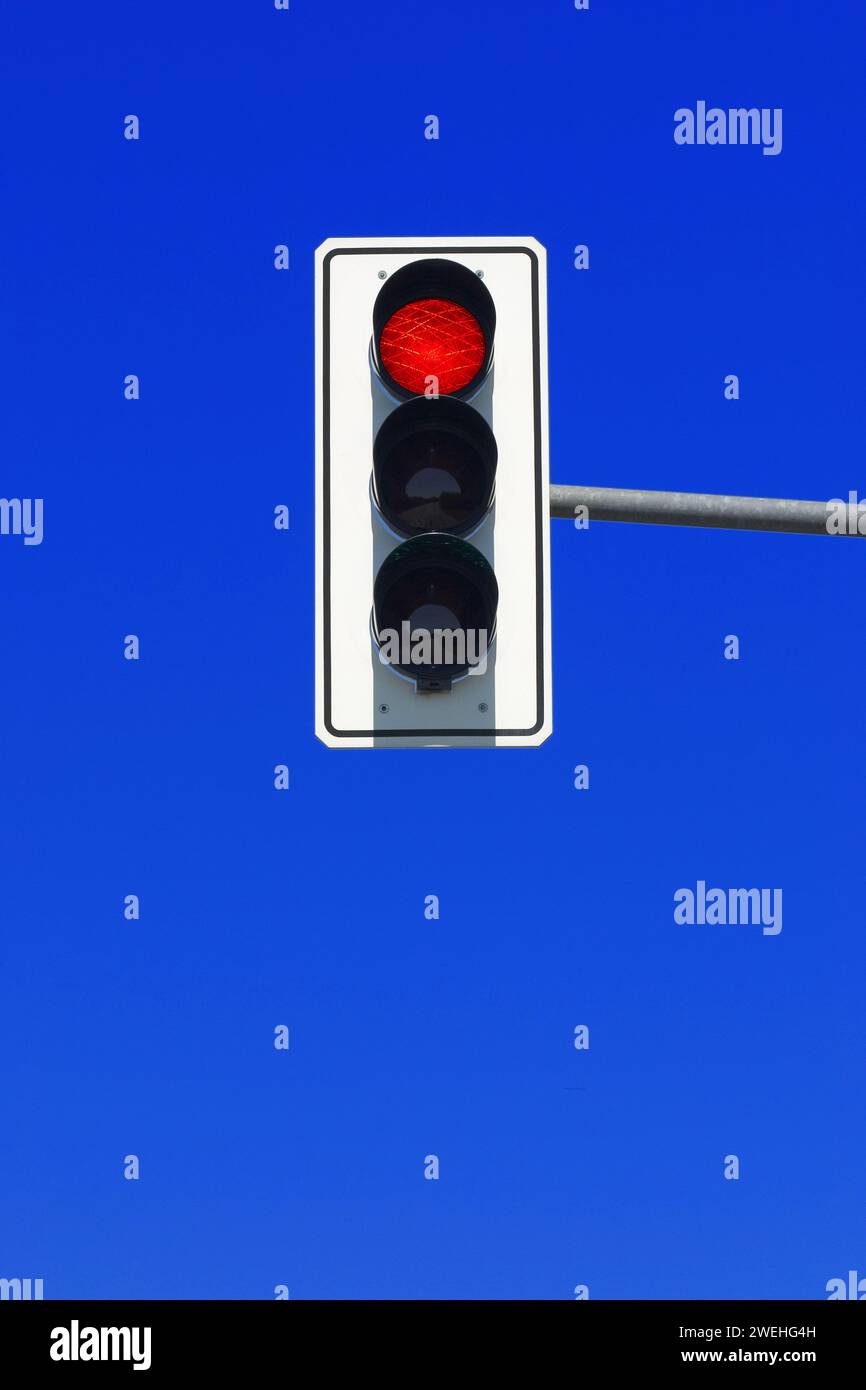 Traffic Lights In Germany Set To Red Against A Blue Sky Stock Photo Traffic Lights In Germany Set To Red Against A Blue Sky Stock Photo