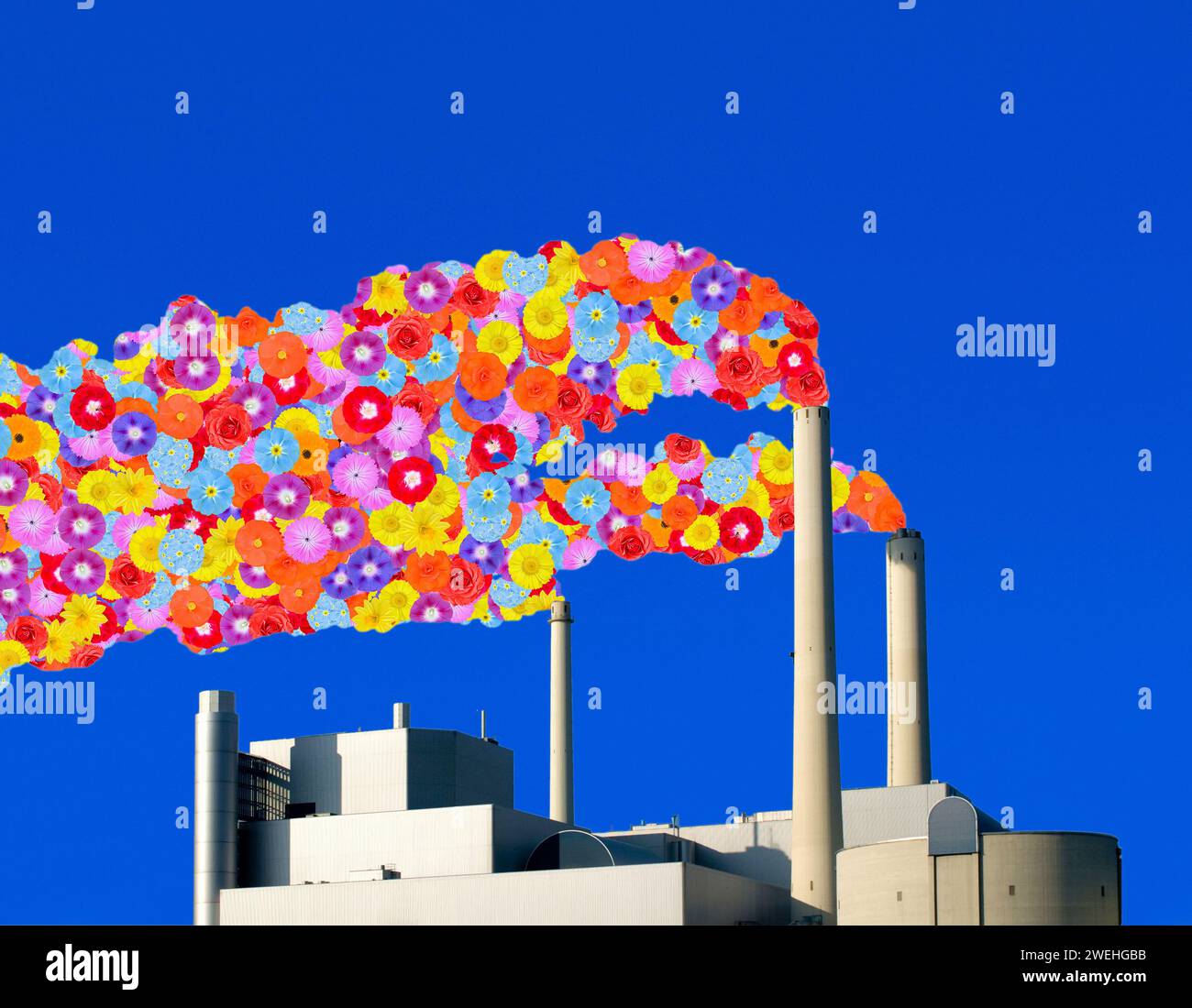 Smoking chimneys from the northern combined heat and power plant, waste to energy planr,  Munich, the smoke is symbolised by flowers for clean exhaust Stock Photo