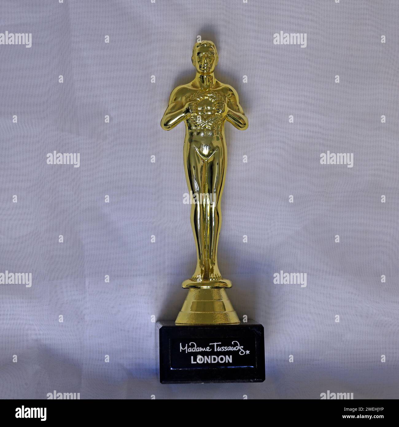 Academy Award statuette - a souvenir of Madame Tussauds of London, Studio set up on light / white background Stock Photo