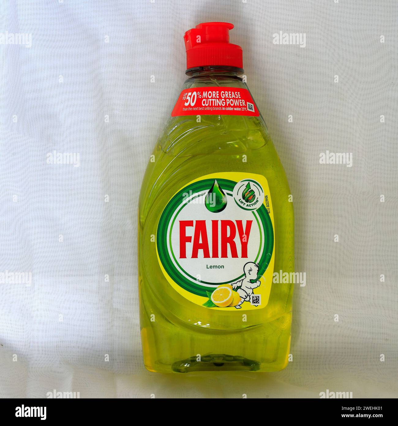 Fairy Liquid washing up liquid bottle, yellow. Studio set up on light / white background Stock
