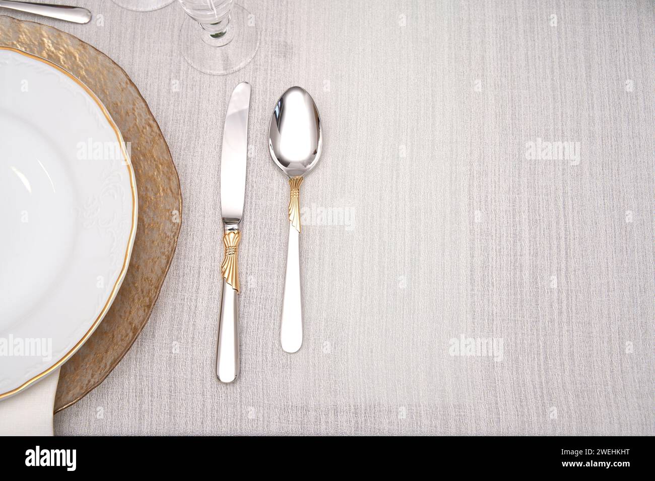 top view of stylish elegant table setting on light background. copy space for text Stock Photo