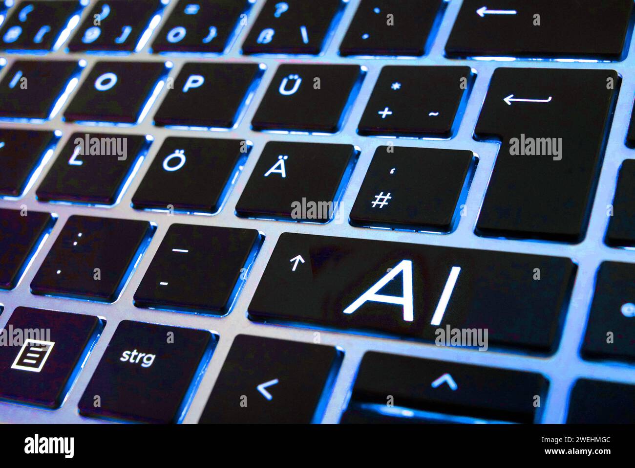 FOTOMONTAGE - Artificial Intelligence, Künstliche Intelligenz. Nahaufnahme einer Laptop-Tastatur mit einer AI-Taste *** FOTOMONTAGE Artificial Intelligence, Artificial Intelligence Close-up of a laptop keyboard with an AI key Stock Photo