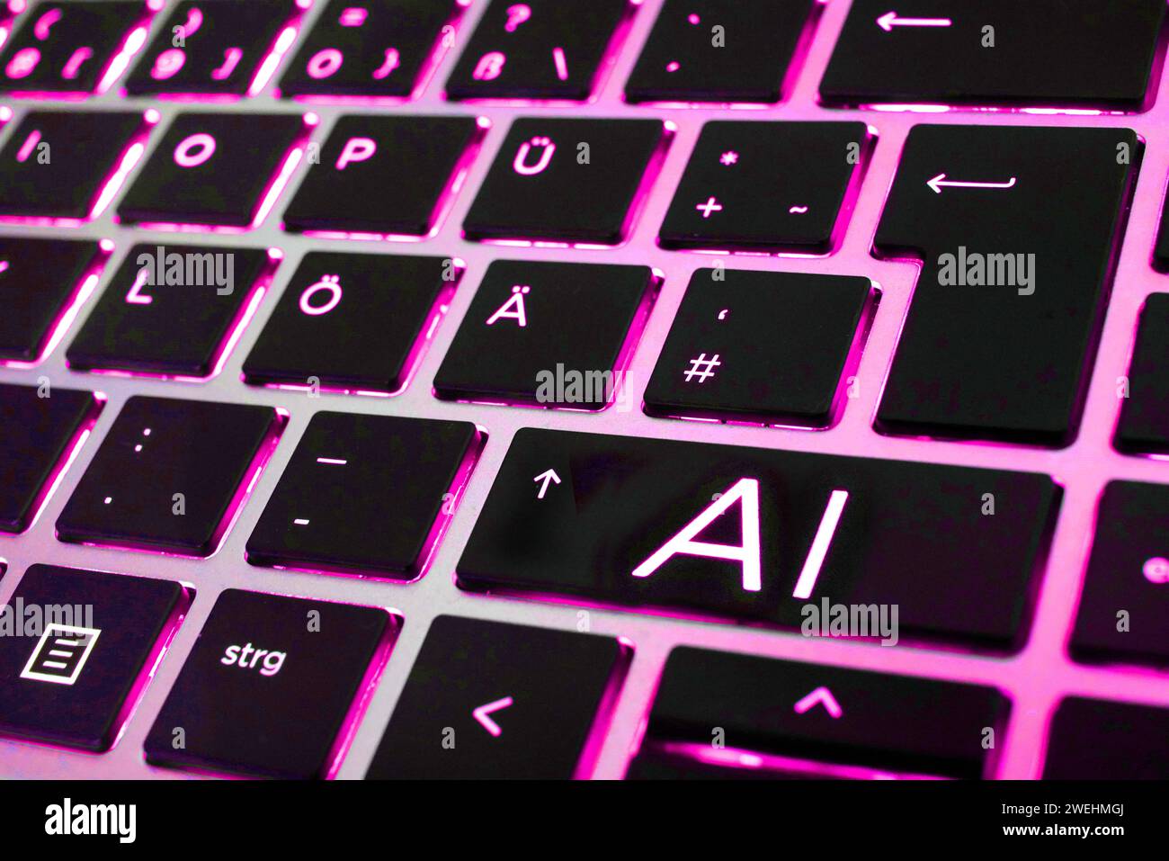 FOTOMONTAGE - Artificial Intelligence, Künstliche Intelligenz. Nahaufnahme einer Laptop-Tastatur mit einer AI-Taste *** FOTOMONTAGE Artificial Intelligence, Artificial Intelligence Close-up of a laptop keyboard with an AI key Stock Photo