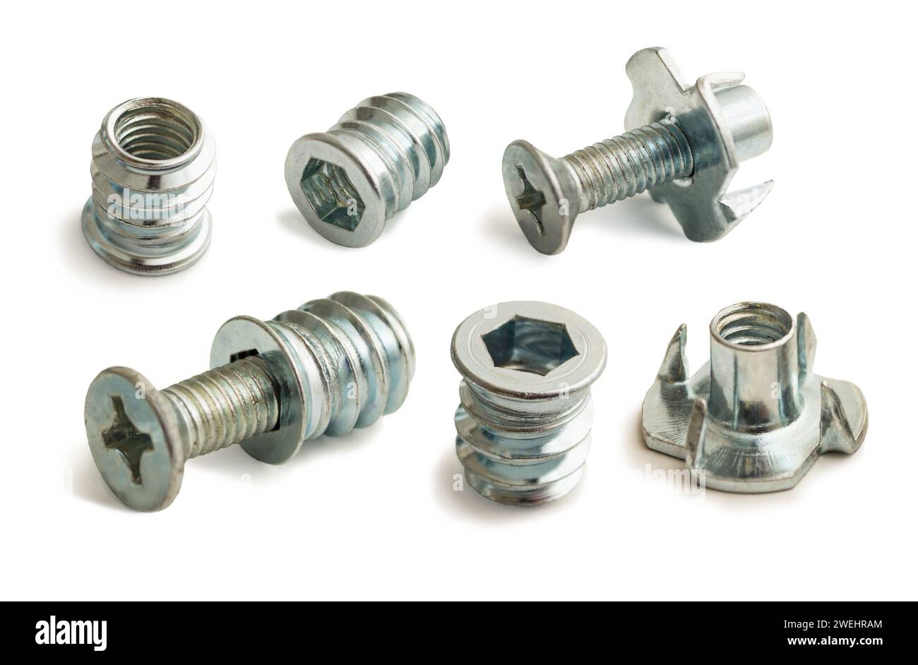 Fasteners, nuts, for assembling wooden furniture isolated on white