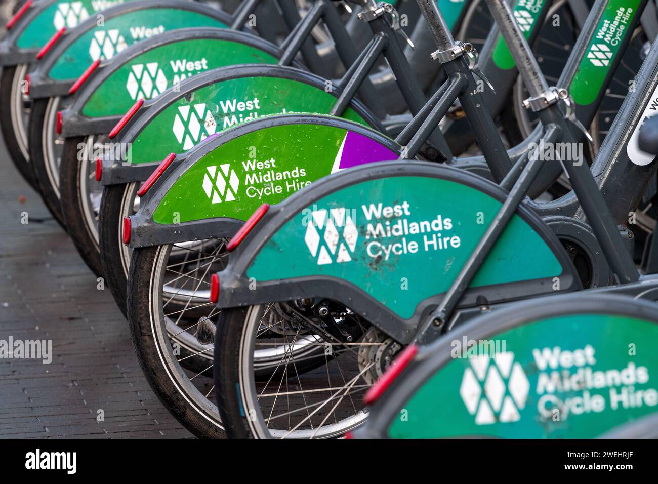Line of West Midlands Cycle Hire bikes in Coventry, West Midlands, UK. Stock Photo