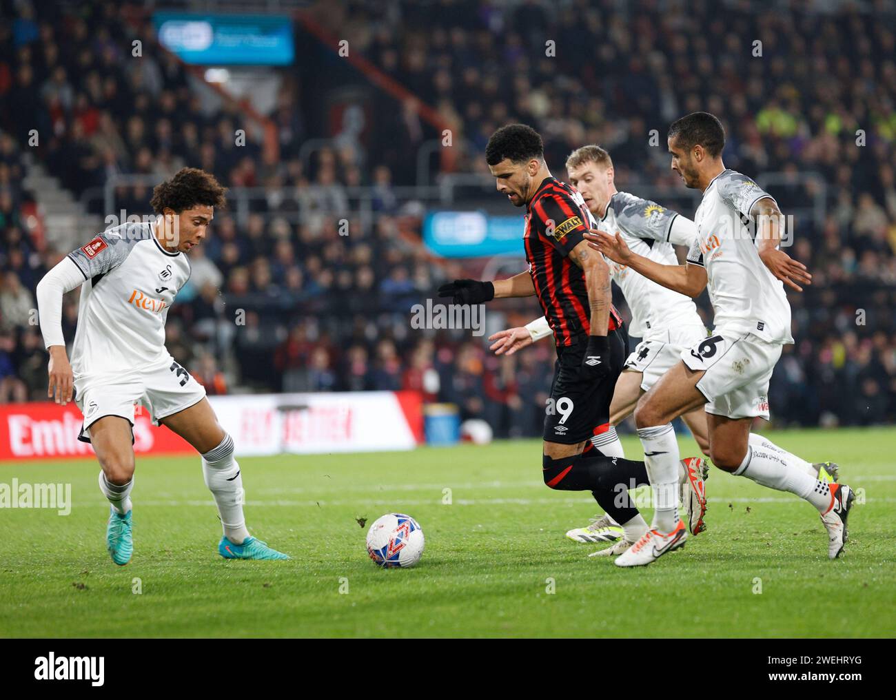 Vitality Stadium, Boscombe, Dorset, UK. 25th Jan, 2024. FA Cup Fourth Round Football, AFC Bournemouth versus Swansea; Dominic Solanke of Bournemouth brings ball into Swansea's box as Naughton of Swansea pressures Credit: Action Plus Sports/Alamy Live News Stock Photo