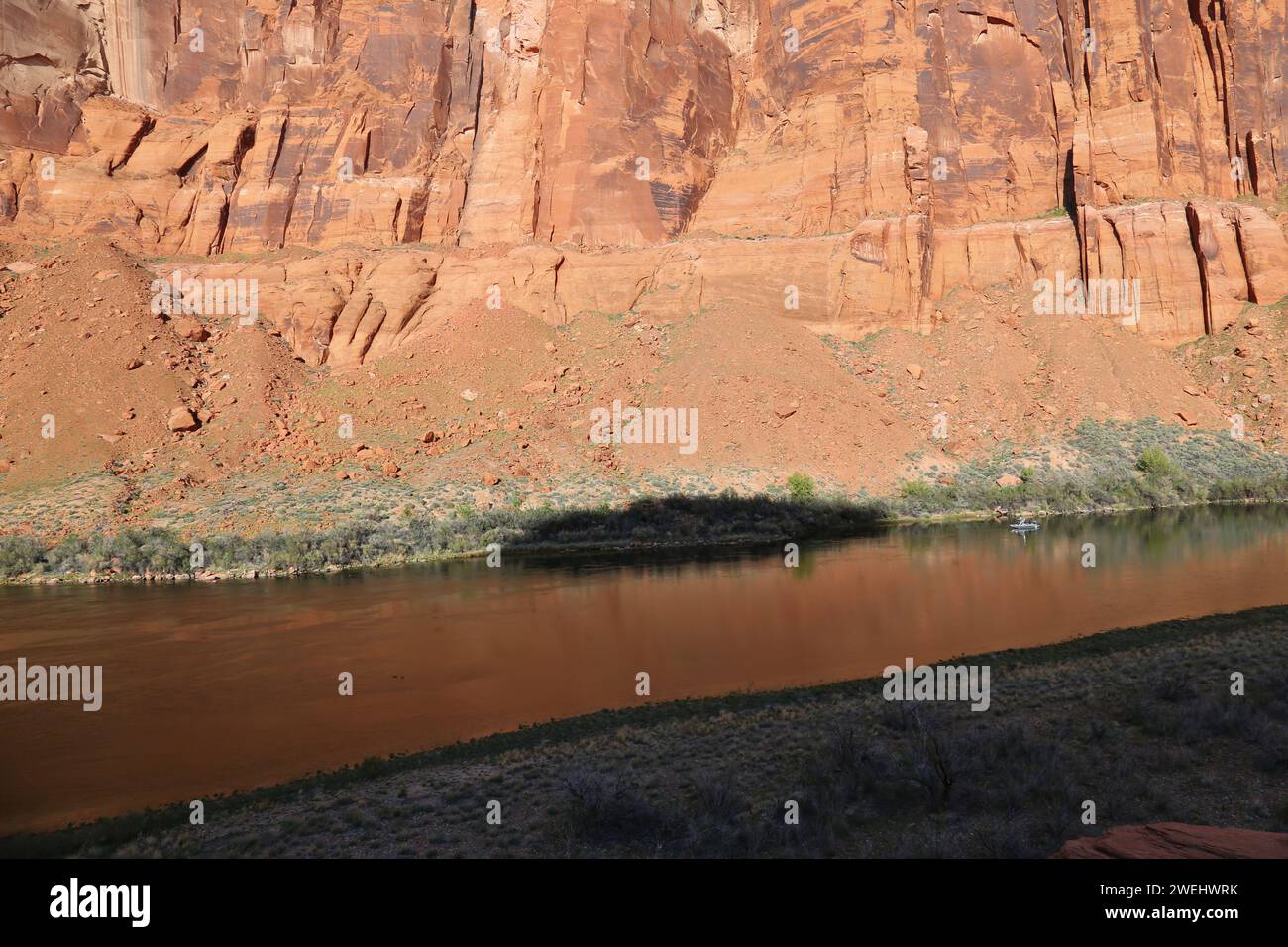 A fishing boat on the Colorado river on the north half of Horseshoe Bend.  Located just outside of Page, Arizona. Stock Photo