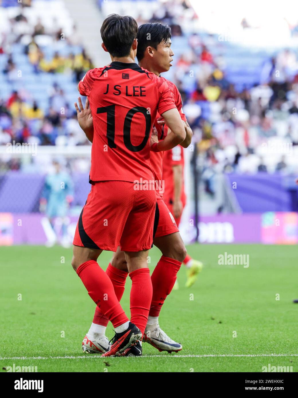 AL WAKRAH, QATAR - JANUARY 25: Jeong Woo-yeong of South Korea celebrates with Lee Jae-sung after scoring a goal during the AFC Asian Cup Group E match Stock Photo