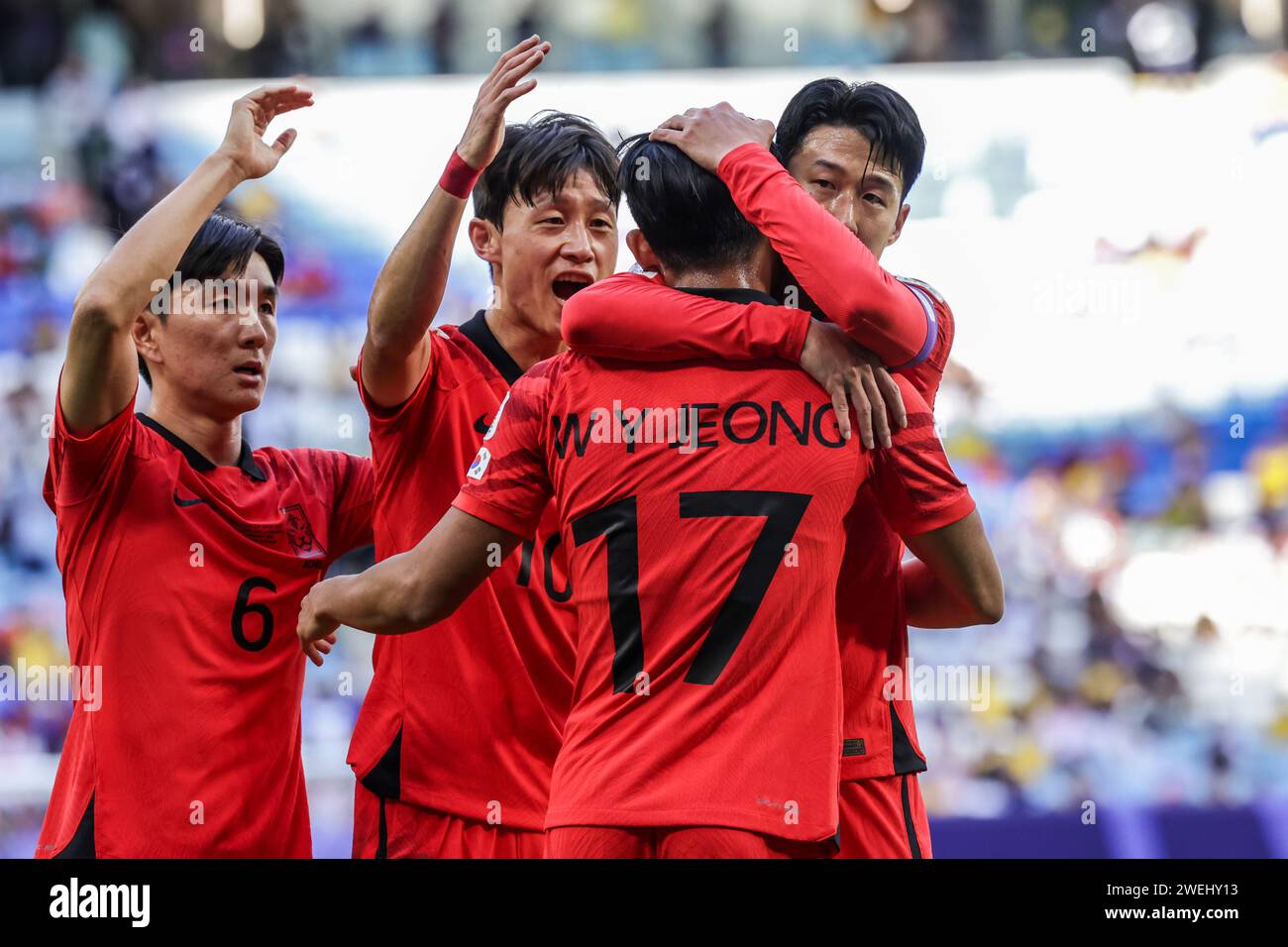 AL WAKRAH, QATAR - JANUARY 25: Jeong Woo-yeong of South Korea celebrates with Son Heung-min, Hwang In-beom, Lee Jae-sung after scoring a goal during t Stock Photo