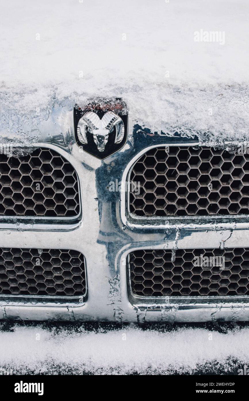 snow-covered grill of Dodge Ram truck Stock Photo
